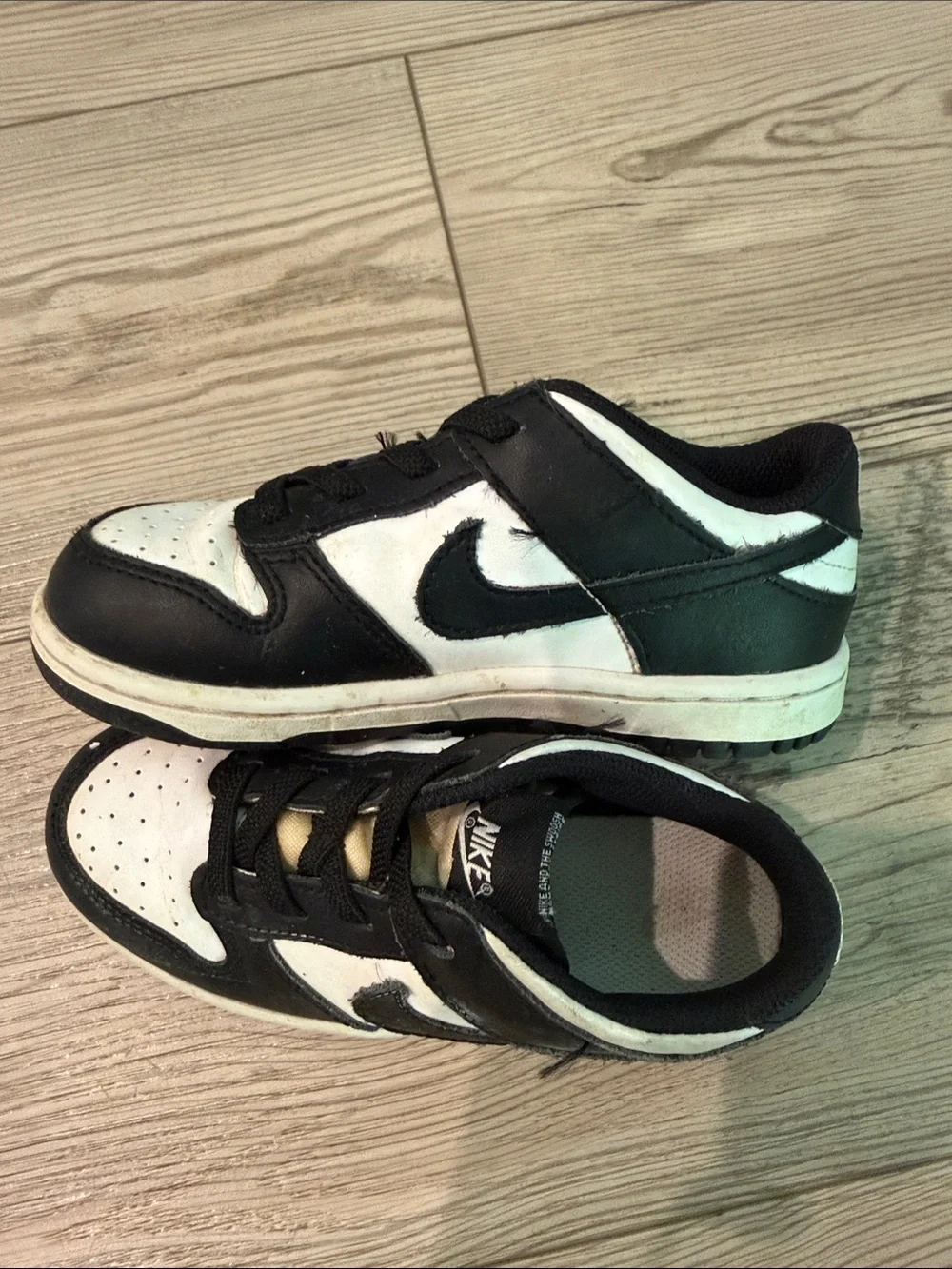 Nike Kids Black and White Low-Top Sneakers with Swoosh